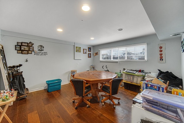 dining area with hardwood / wood-style floors