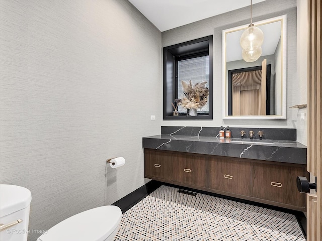 bathroom with vanity and toilet