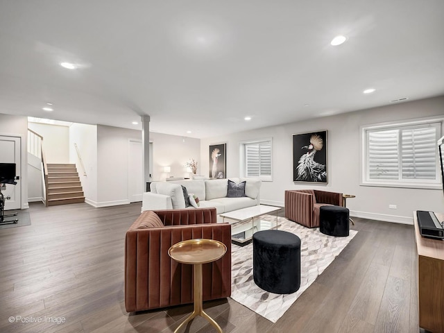 living room with dark hardwood / wood-style floors