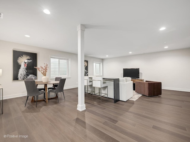 dining area featuring wood-type flooring