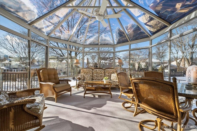 sunroom / solarium featuring ceiling fan