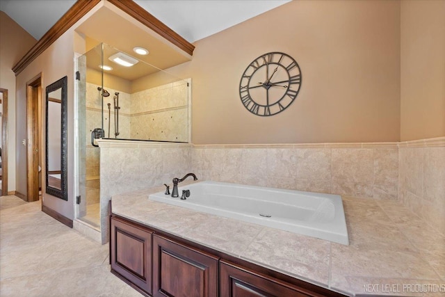 bathroom featuring tile patterned floors and separate shower and tub