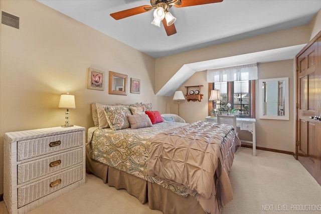 carpeted bedroom with ceiling fan