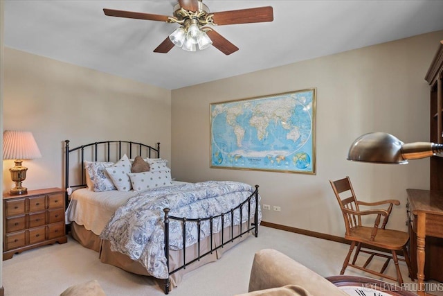 bedroom with ceiling fan and light colored carpet