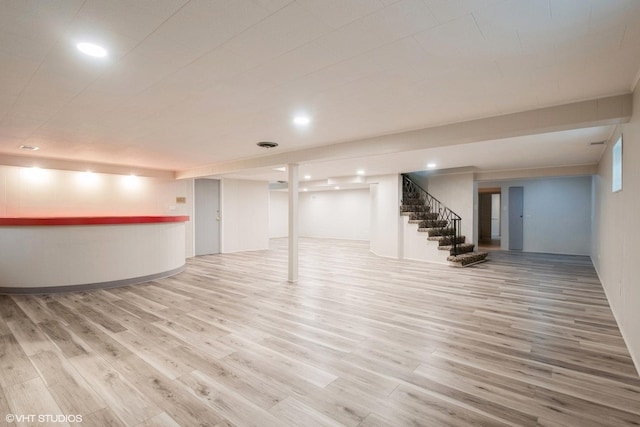 basement with wood-type flooring