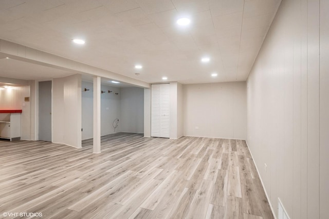 basement with light wood-type flooring