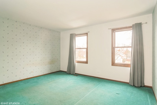 spare room with carpet flooring