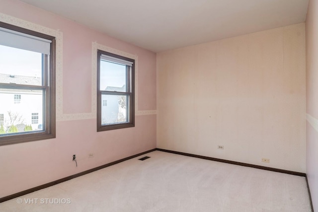 view of carpeted spare room