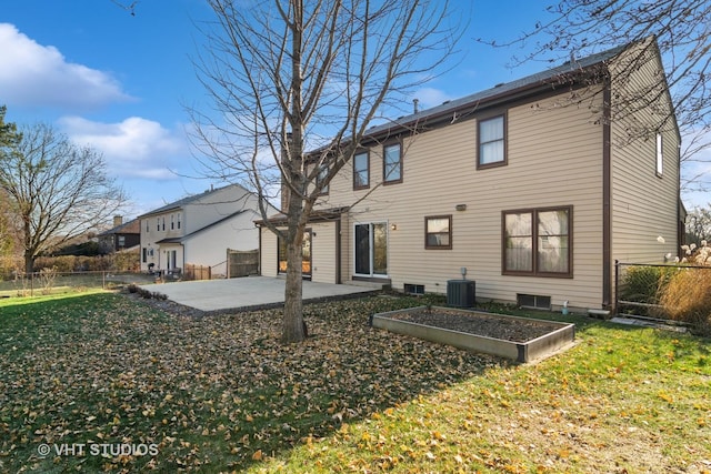 rear view of property with central AC, a yard, and a patio