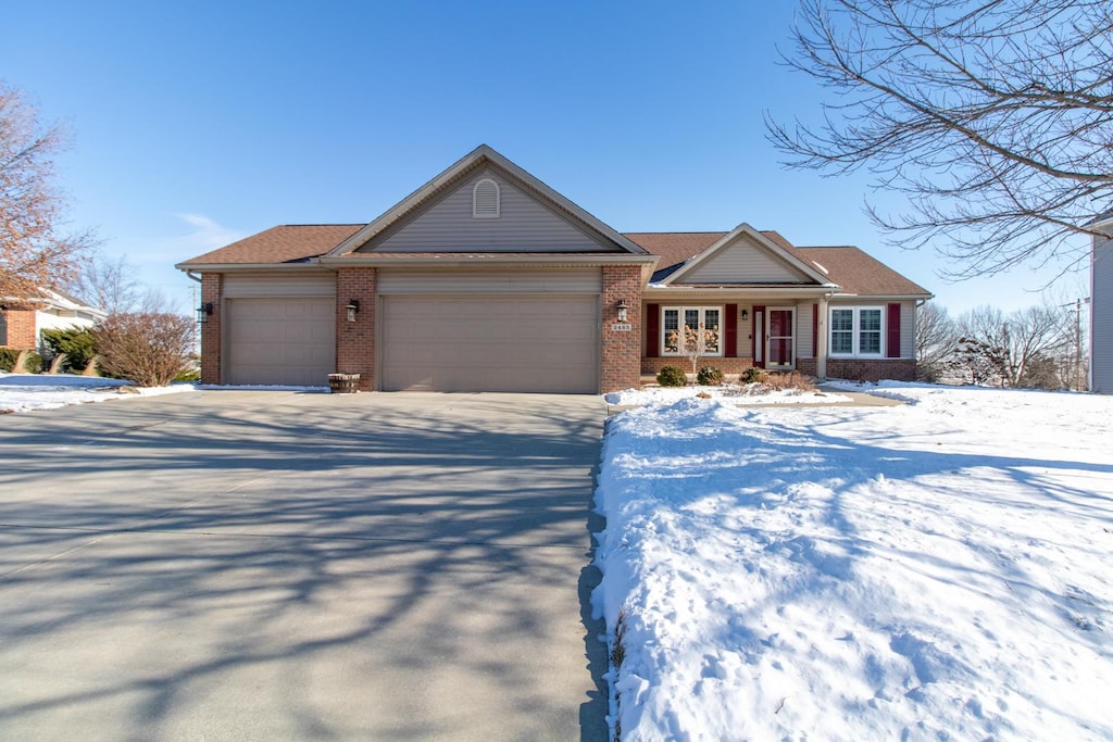 ranch-style home with a garage