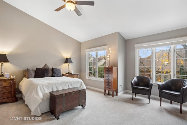 carpeted bedroom featuring ceiling fan and lofted ceiling