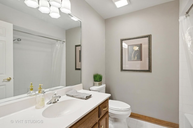 full bathroom featuring tile patterned floors, shower / tub combo with curtain, vanity, and toilet