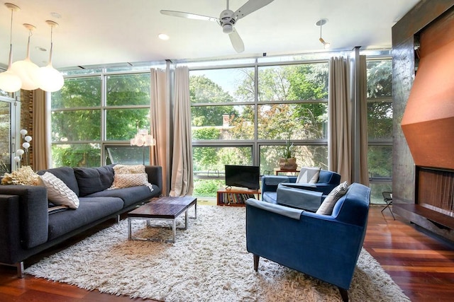 sunroom featuring ceiling fan