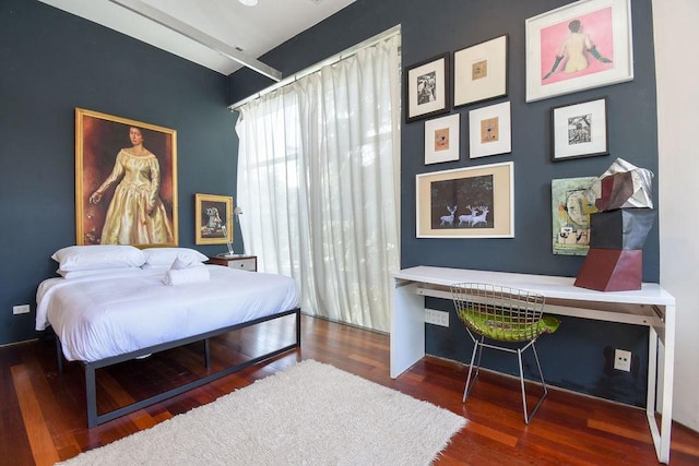 bedroom with wood-type flooring