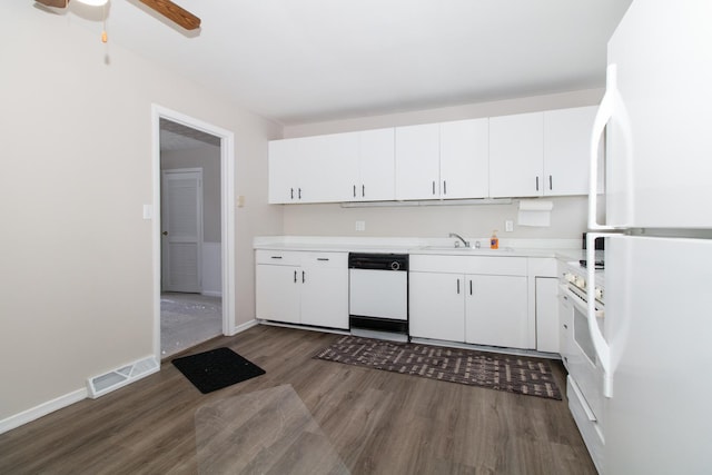 kitchen featuring white appliances, white cabinets, sink, dark hardwood / wood-style floors, and ceiling fan