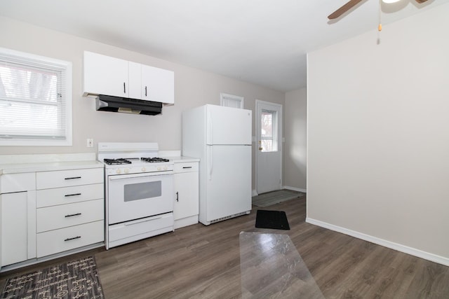 kitchen featuring dark hardwood / wood-style floors, white cabinetry, white appliances, and ceiling fan