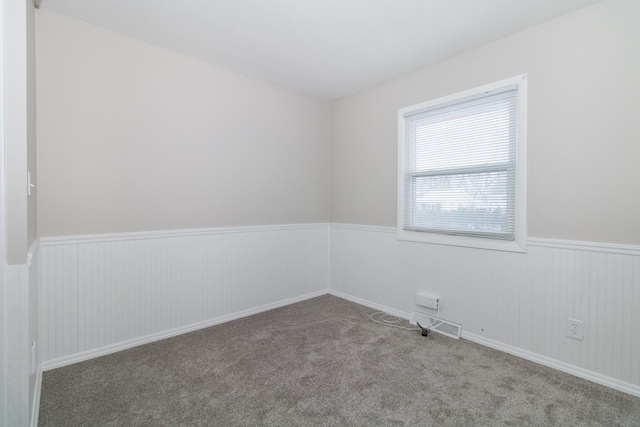 spare room with carpet