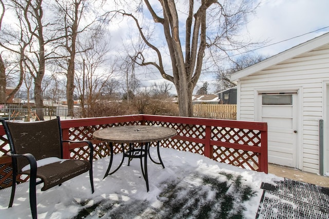 view of snow covered deck