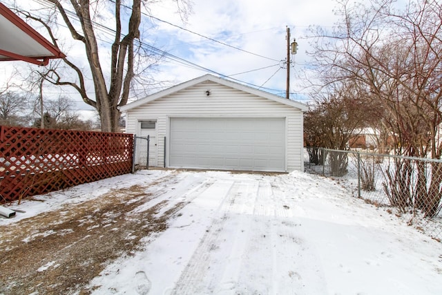 view of snow covered garage