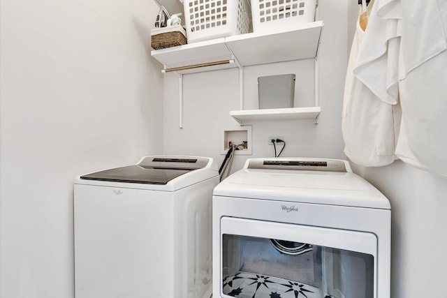 laundry room with separate washer and dryer