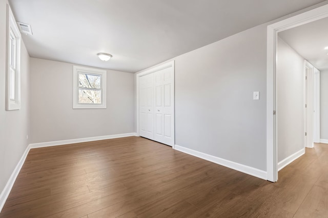 interior space with dark hardwood / wood-style floors