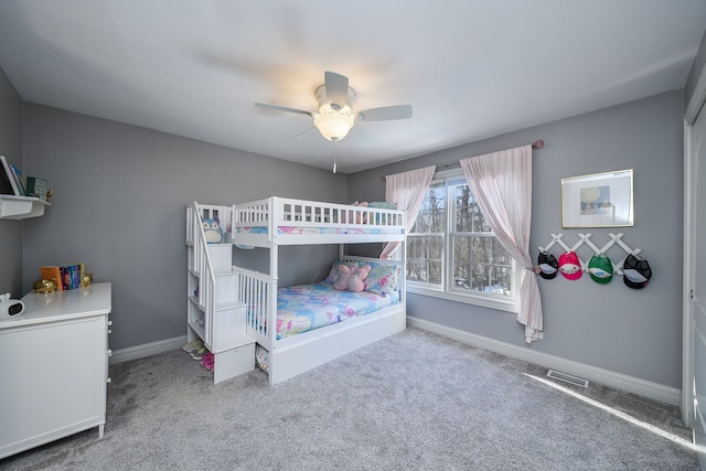 bedroom featuring ceiling fan and carpet flooring