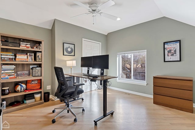 office area with ceiling fan, lofted ceiling, and light hardwood / wood-style flooring