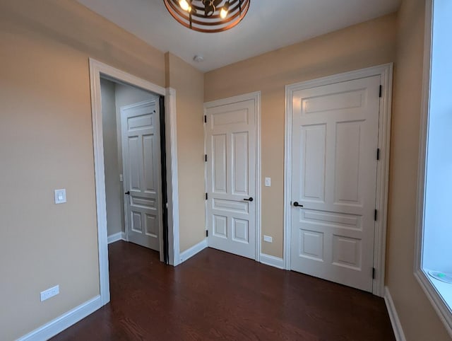 interior space with dark hardwood / wood-style floors