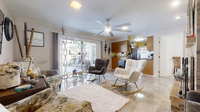 living room with ceiling fan and crown molding