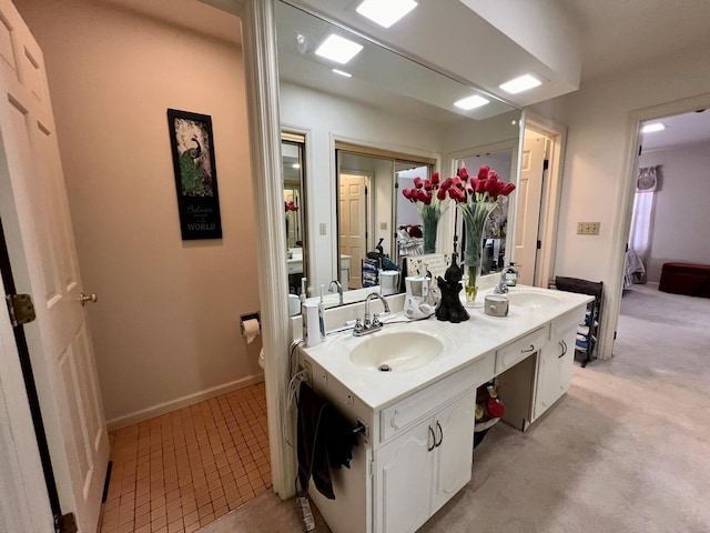 bathroom with toilet and vanity