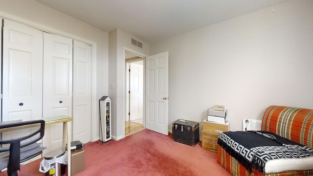 sitting room with carpet flooring