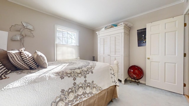 carpeted bedroom featuring ornamental molding