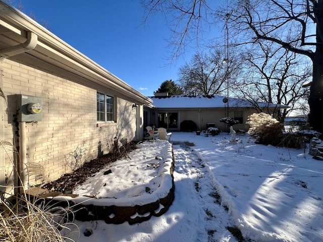 view of snow covered property