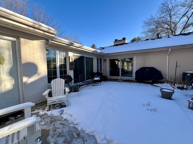 exterior space featuring central AC unit