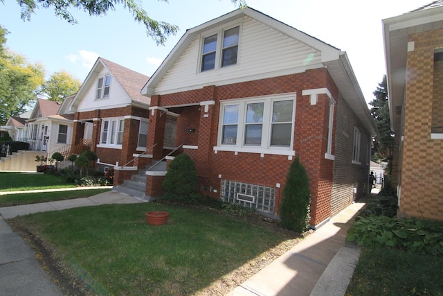 view of front of home with a front lawn