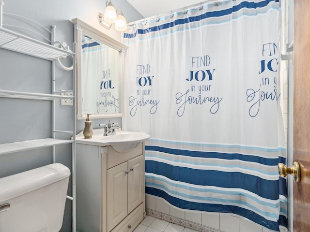 bathroom with toilet, tile patterned floors, a shower with shower curtain, and vanity