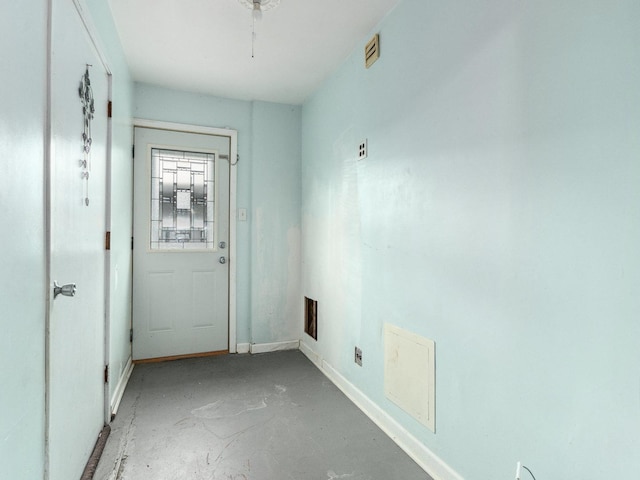 doorway featuring concrete flooring