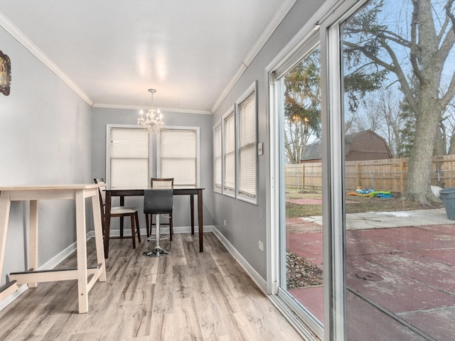 interior space with an inviting chandelier, crown molding, and wood-type flooring