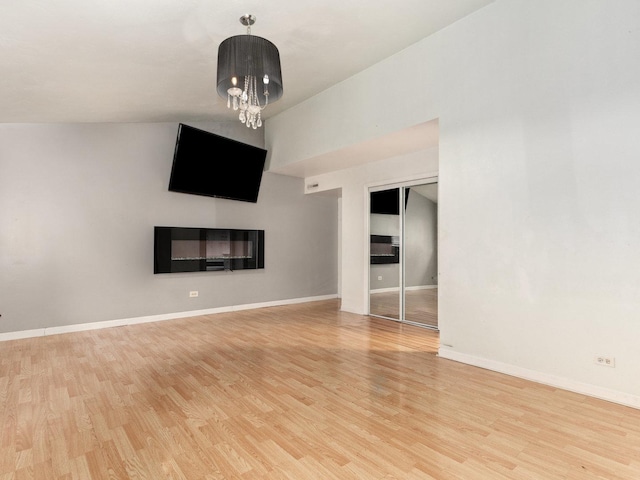 unfurnished living room with light hardwood / wood-style floors