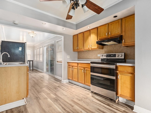 kitchen with light hardwood / wood-style floors, sink, refrigerator, ornamental molding, and stainless steel range with electric stovetop