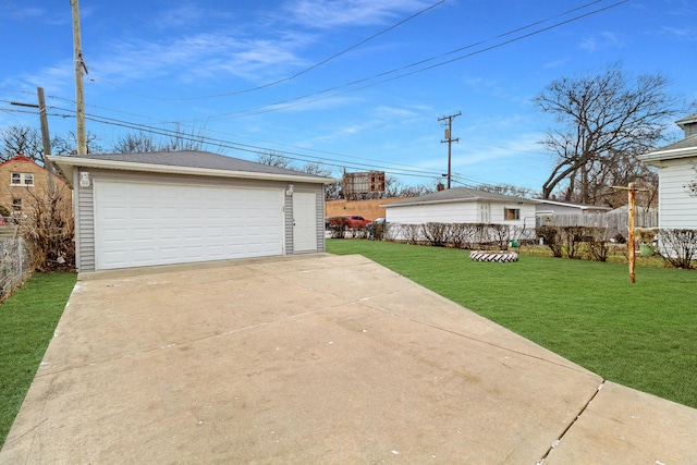 garage with a yard