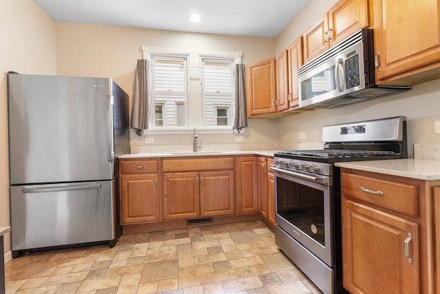 kitchen featuring sink and appliances with stainless steel finishes