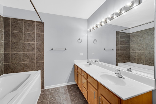 bathroom featuring tile patterned flooring, vanity, and bathtub / shower combination