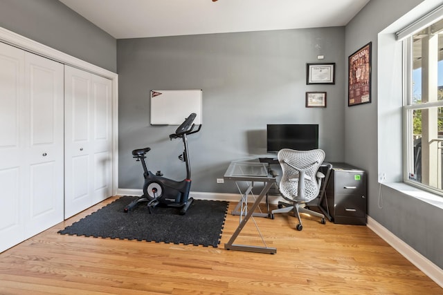 home office with light wood-type flooring