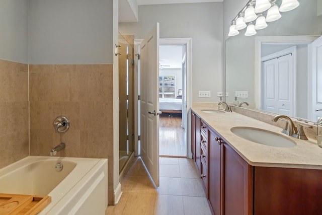 bathroom with tile patterned flooring and vanity