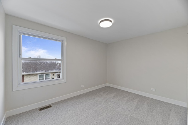 empty room featuring carpet