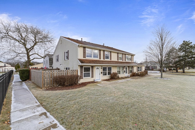 view of front of home with a front yard