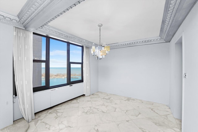 unfurnished dining area featuring a water view, ornamental molding, and a chandelier