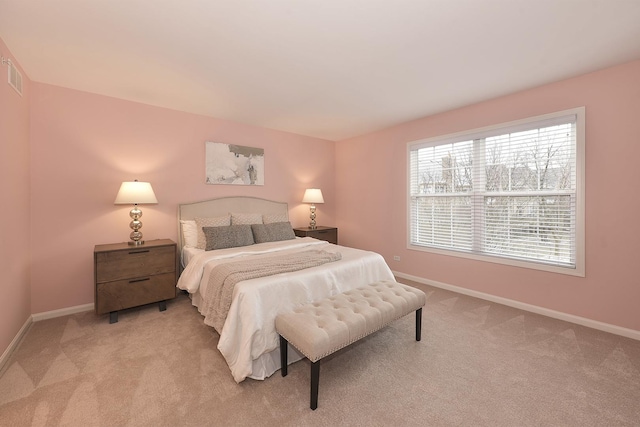 bedroom with light carpet