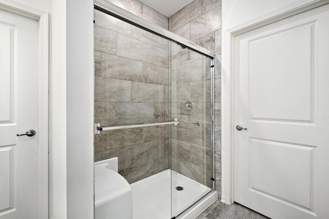 bathroom featuring an enclosed shower